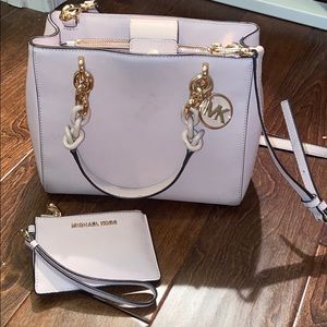 Michael Kors light pink purse and wallet